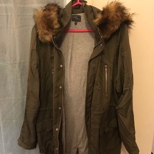 Green jacket with removable fur hood